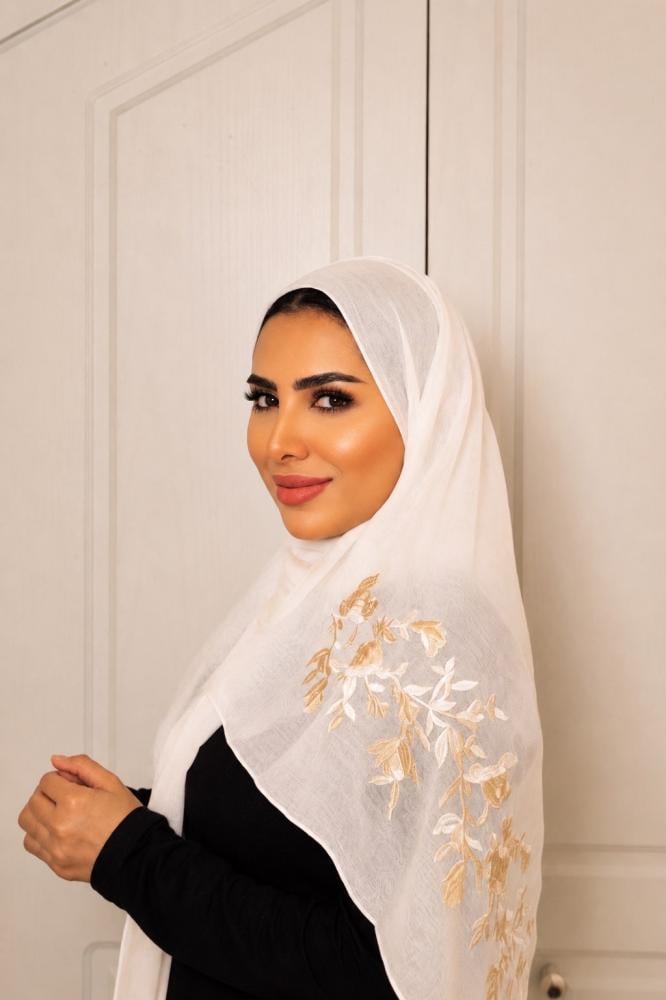 Raneem presented a white dress