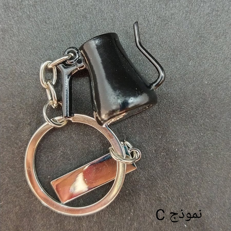 ميدالية مفاتيح تعليقة