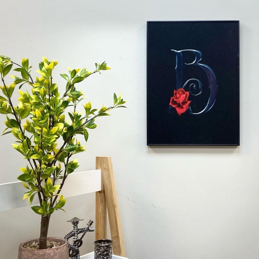 Wooden plaque with a frame for the letter B