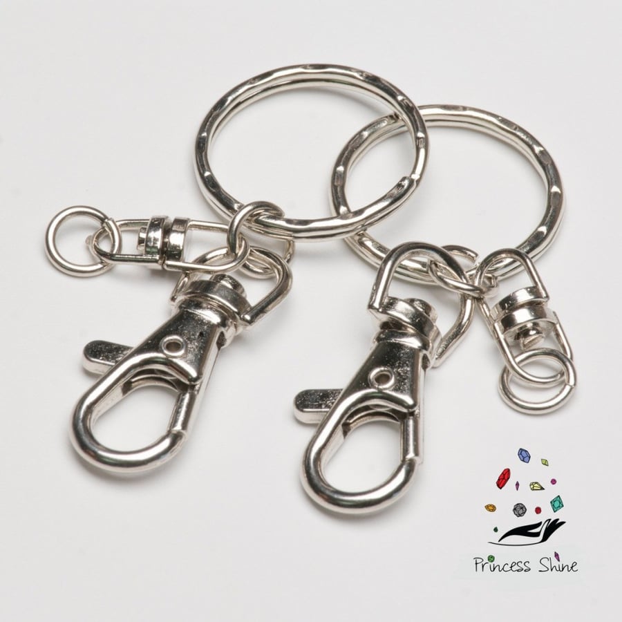 202 - Silver keychain medal (5) pieces