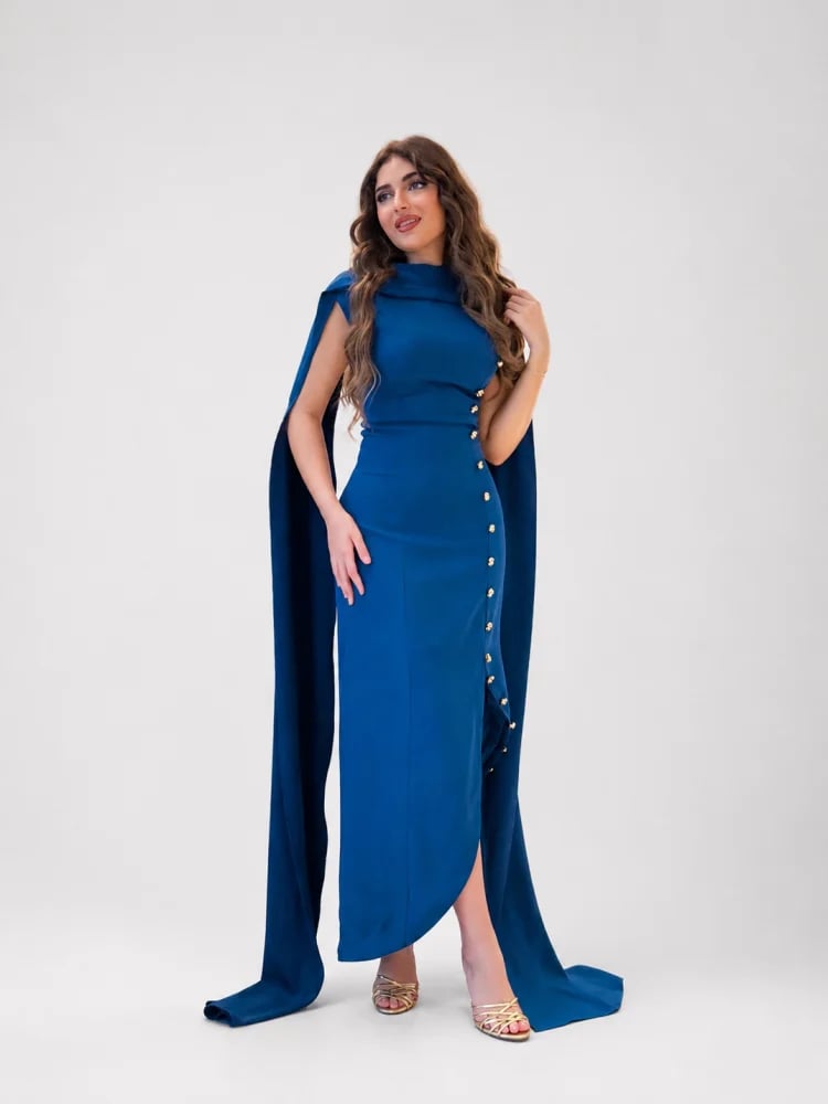 Luxurious blue crepe soft dress with a back sash adorned with copper buttons
