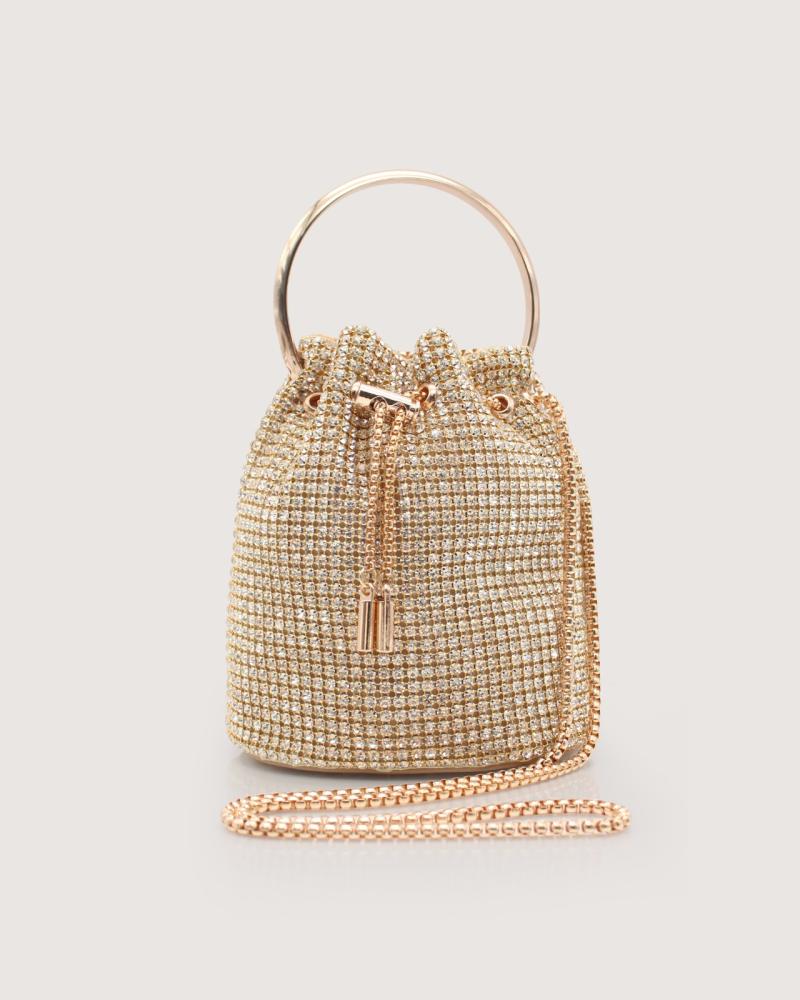 Women's gold evening bag studded with crystals