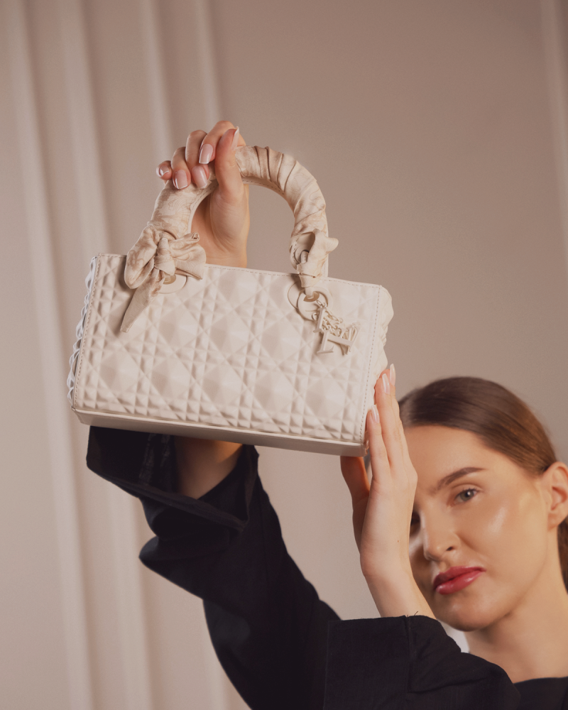 Women's bag with embossed white leather