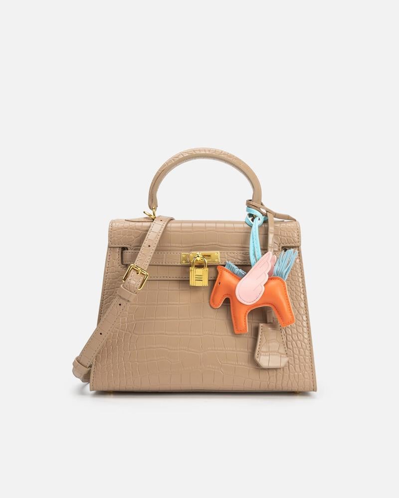 Women's bag with a distinctive design in beige color