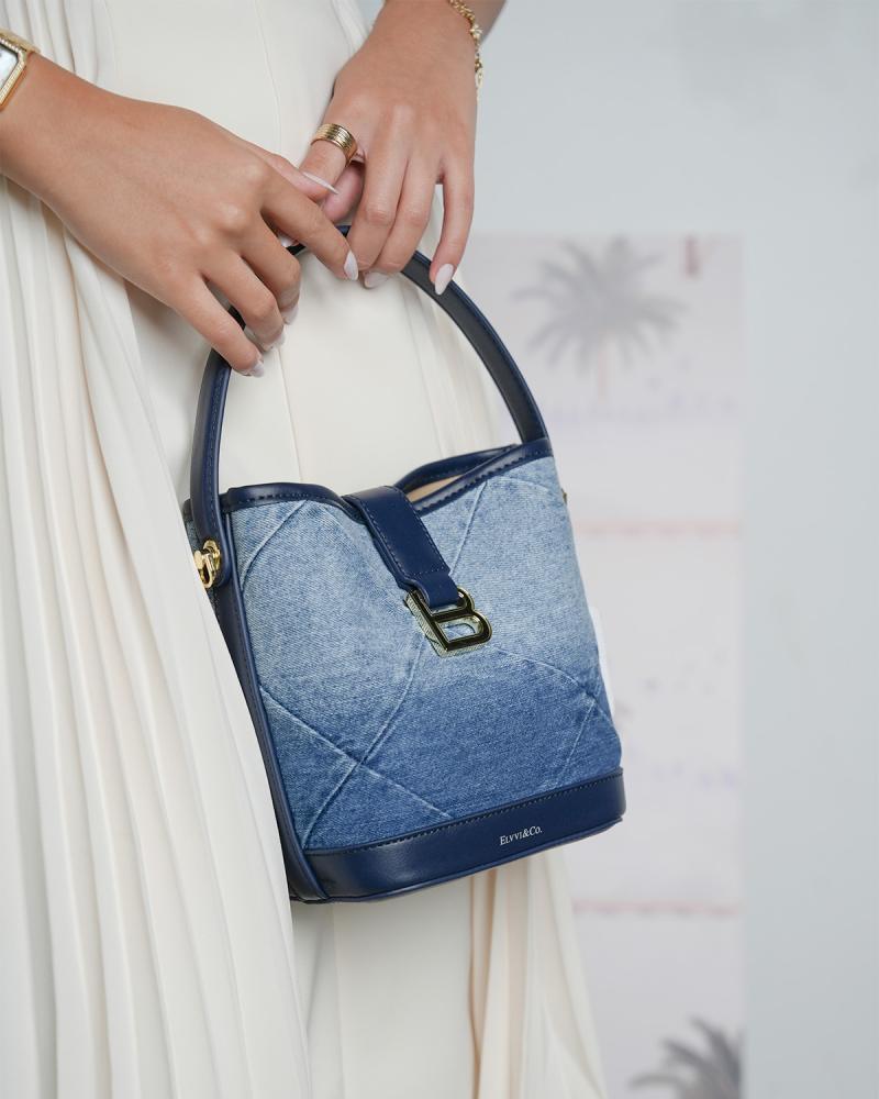 Women's bag made of leather and fabric