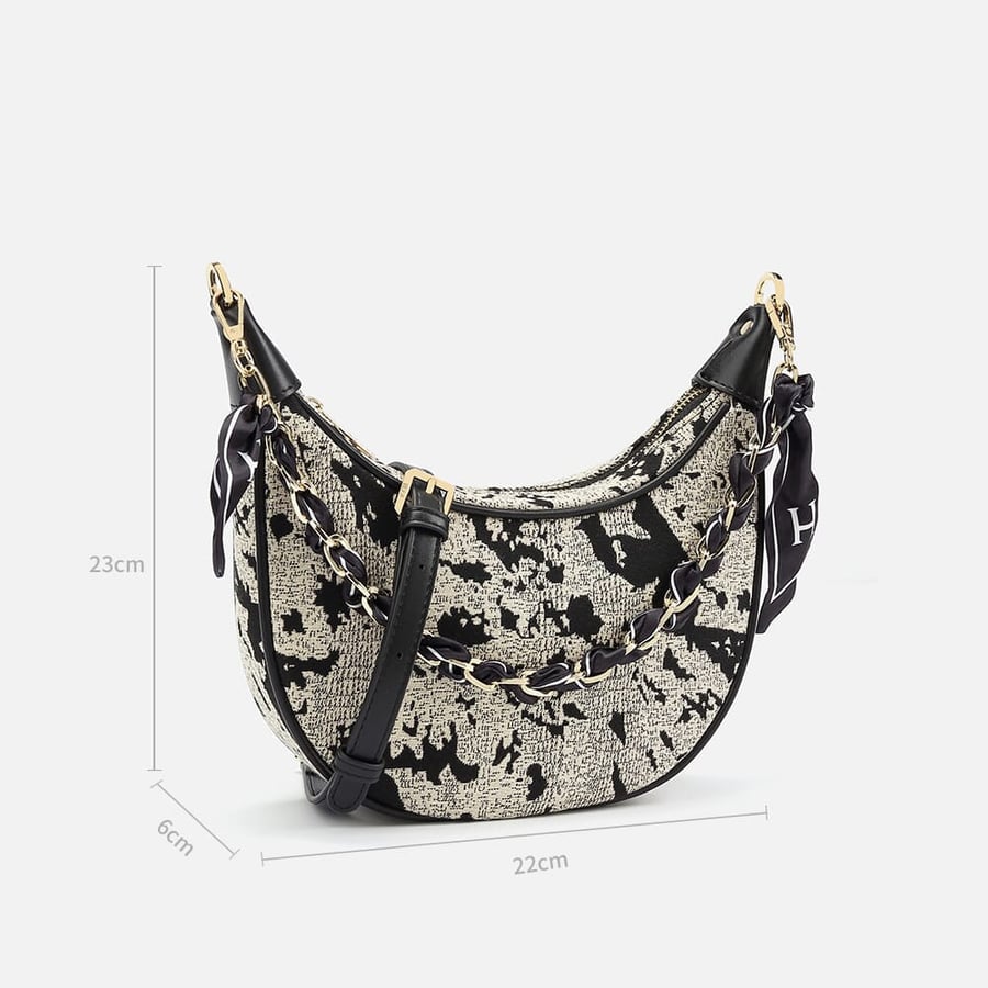 Women's leather handbag in silver and black
