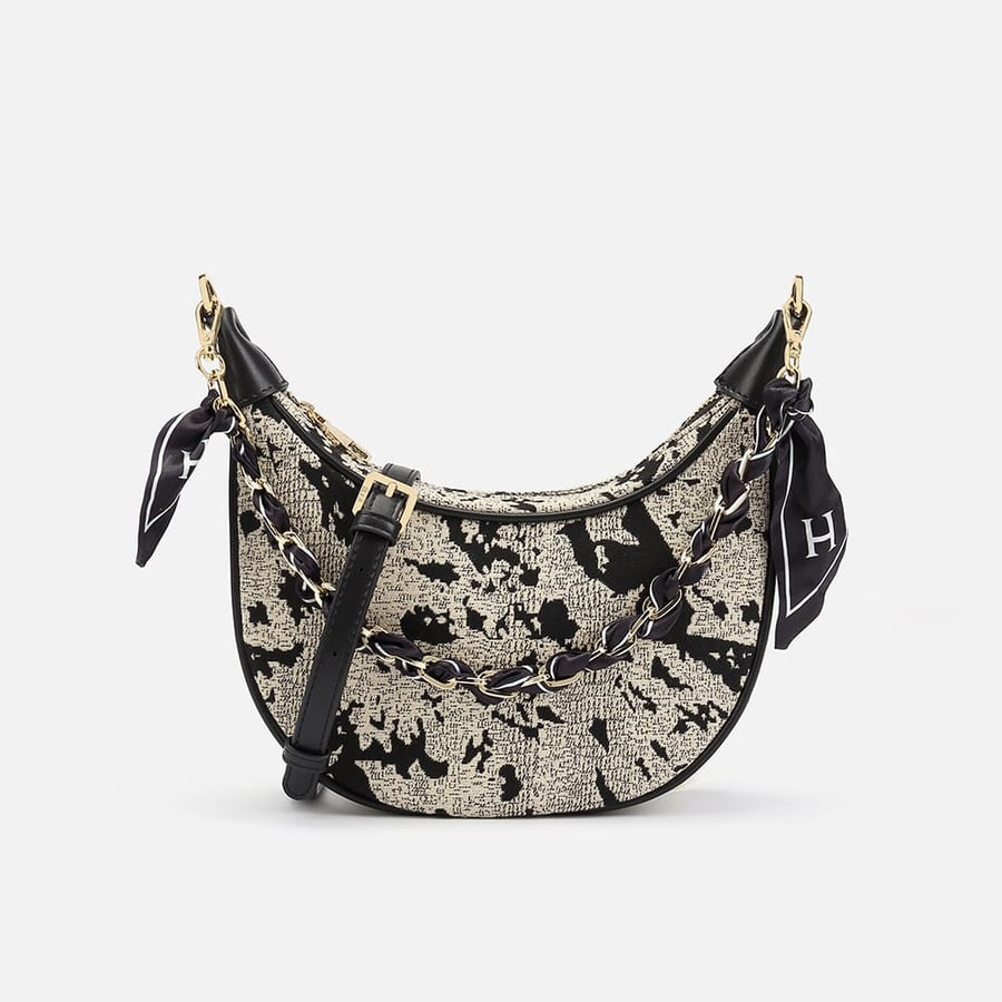 Women's leather handbag in silver and black
