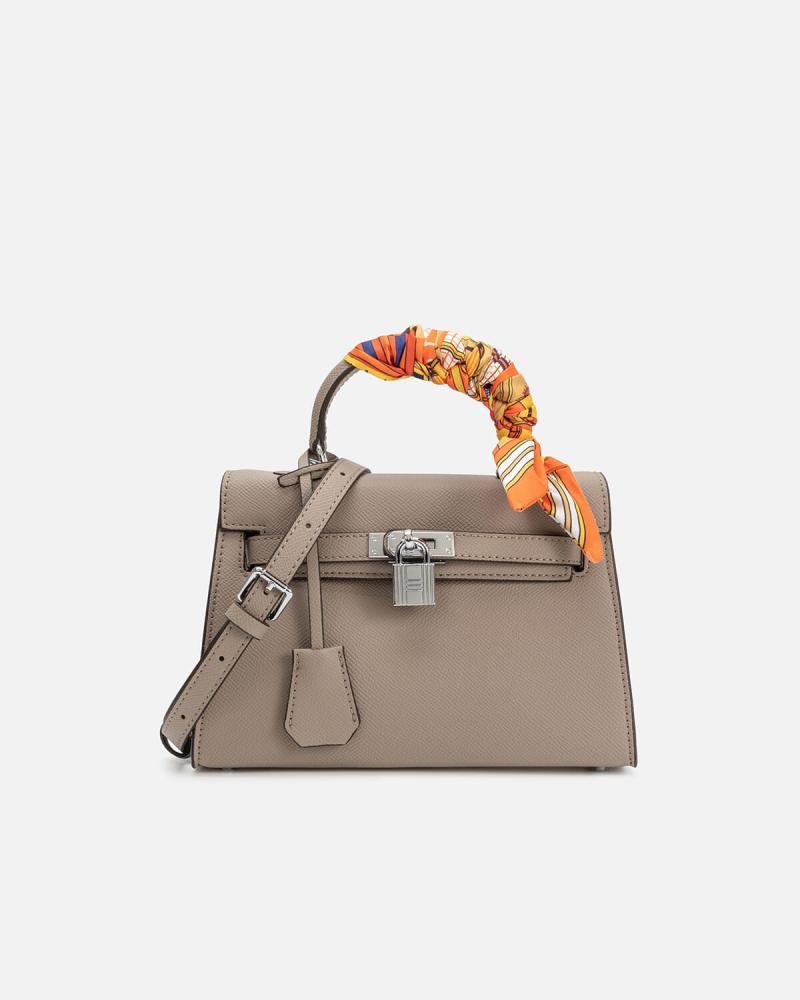 Women's handbag with a modern design in brown