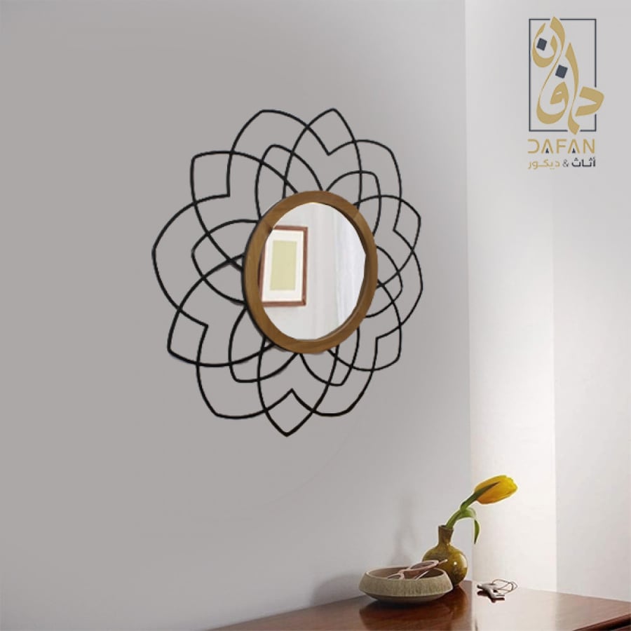 مرآة حائط مربعة سوداء تظهر حدة التصميم الهندسي وقوة الإطار المعدني