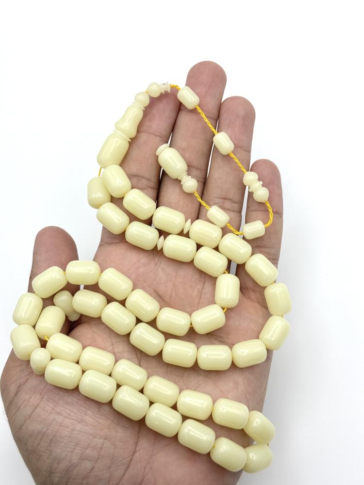 سبحة ضومنة كريمي برميلي