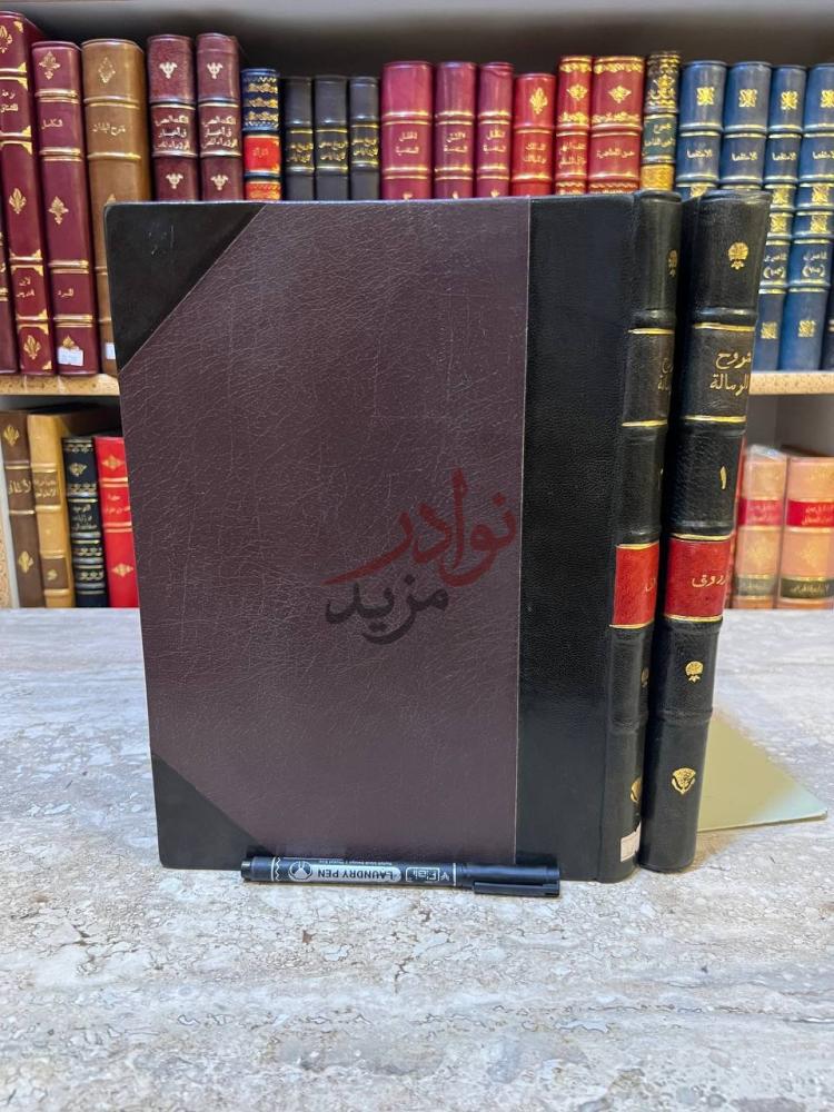 تجليد كتاب شرح احمد زروق مع شرح التنوخى على متن الرسالة