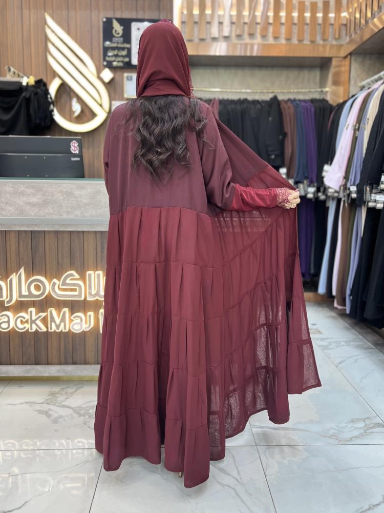 B409 عبايه جودي قصه دبل كلوش طبقات كسرات لون عنابي