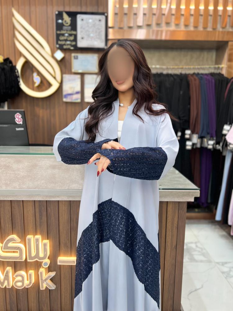 B403 عبايه نالا سماوي قصه كلوش بقماش كريب كوري