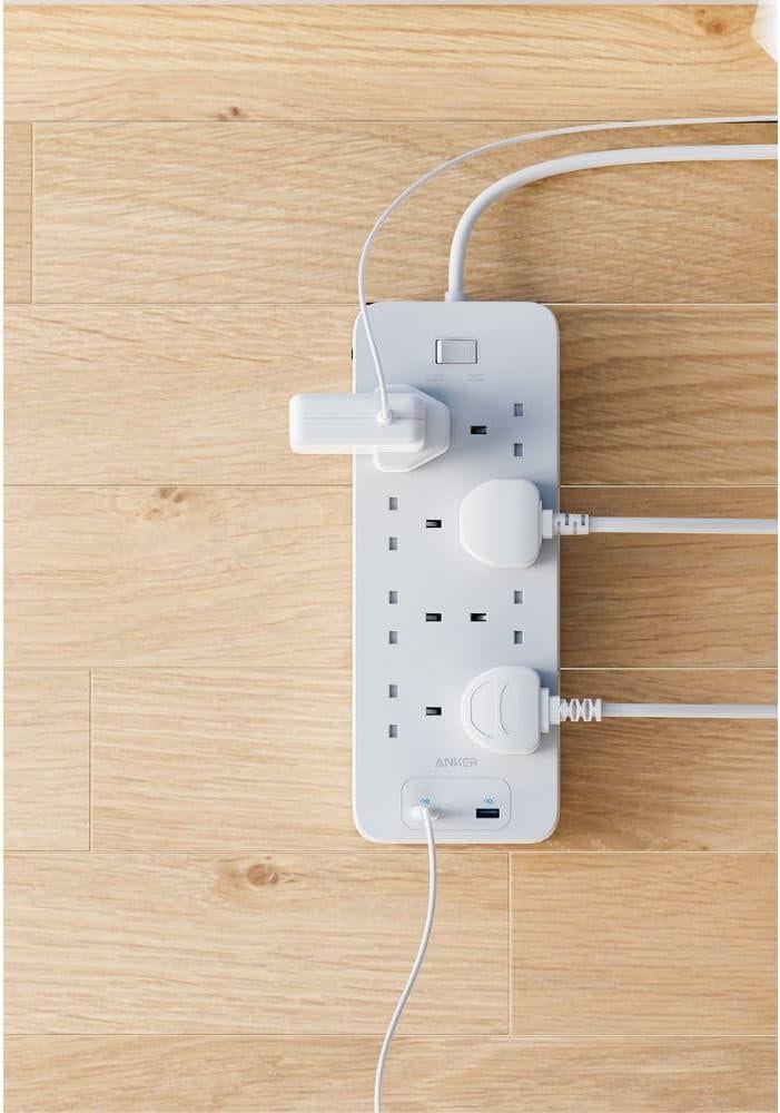 انكر - توصيلة بـ8 منافذ طاقة مع منفذين USB-A بطول 1.8 متر - ابيض