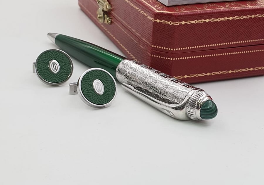 Pen and Cartier cufflink