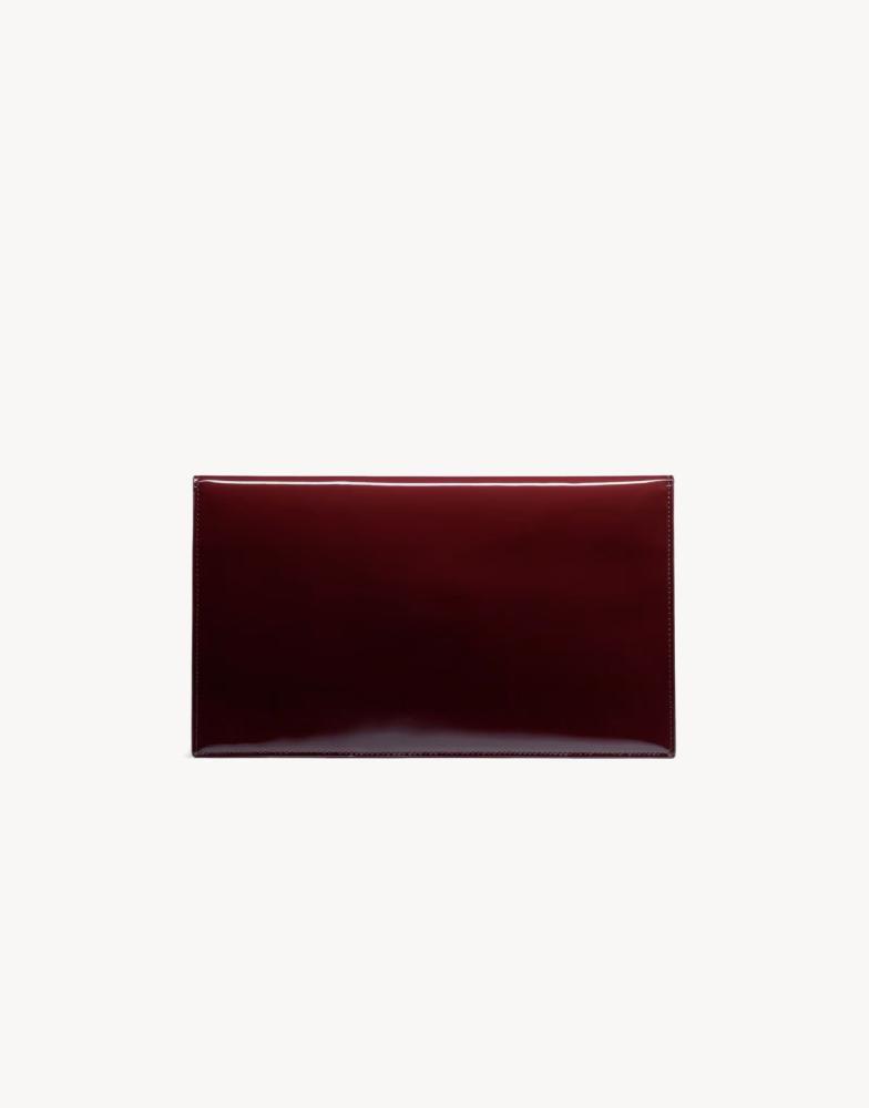 UPTOWN POUCH IN PATENT LEATHER