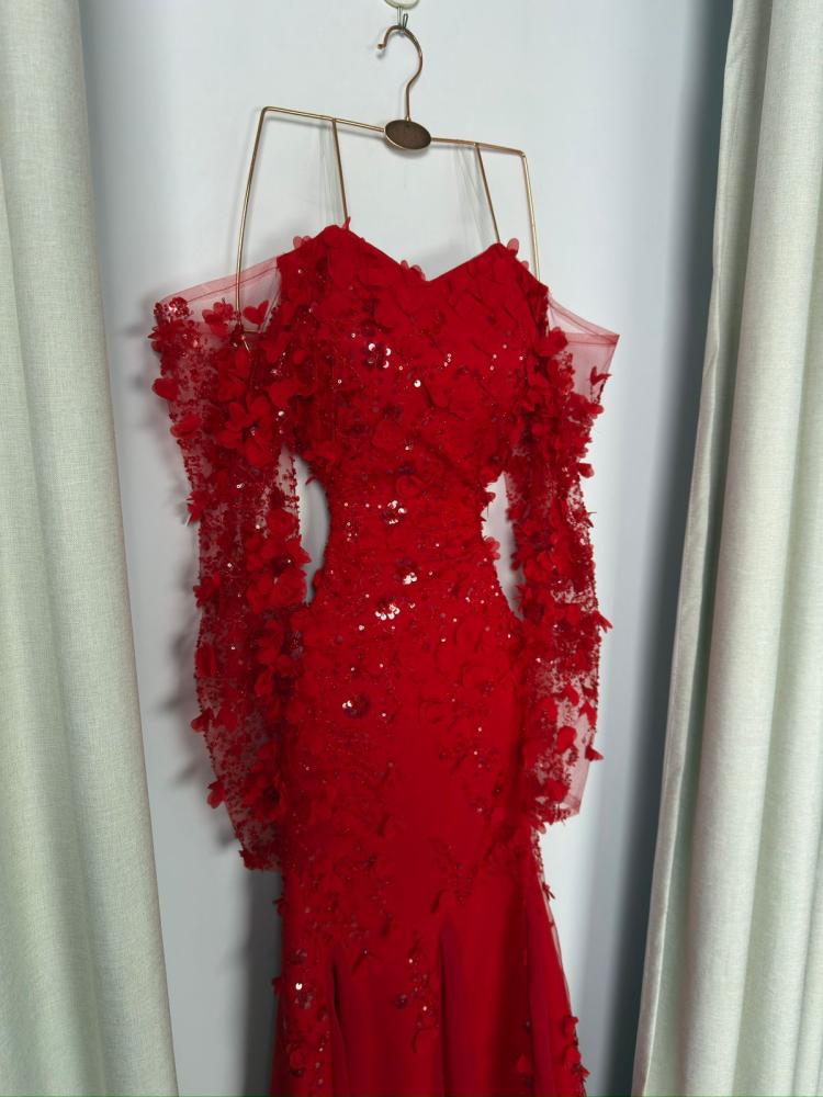 Red Barbie evening dress with a gold belt