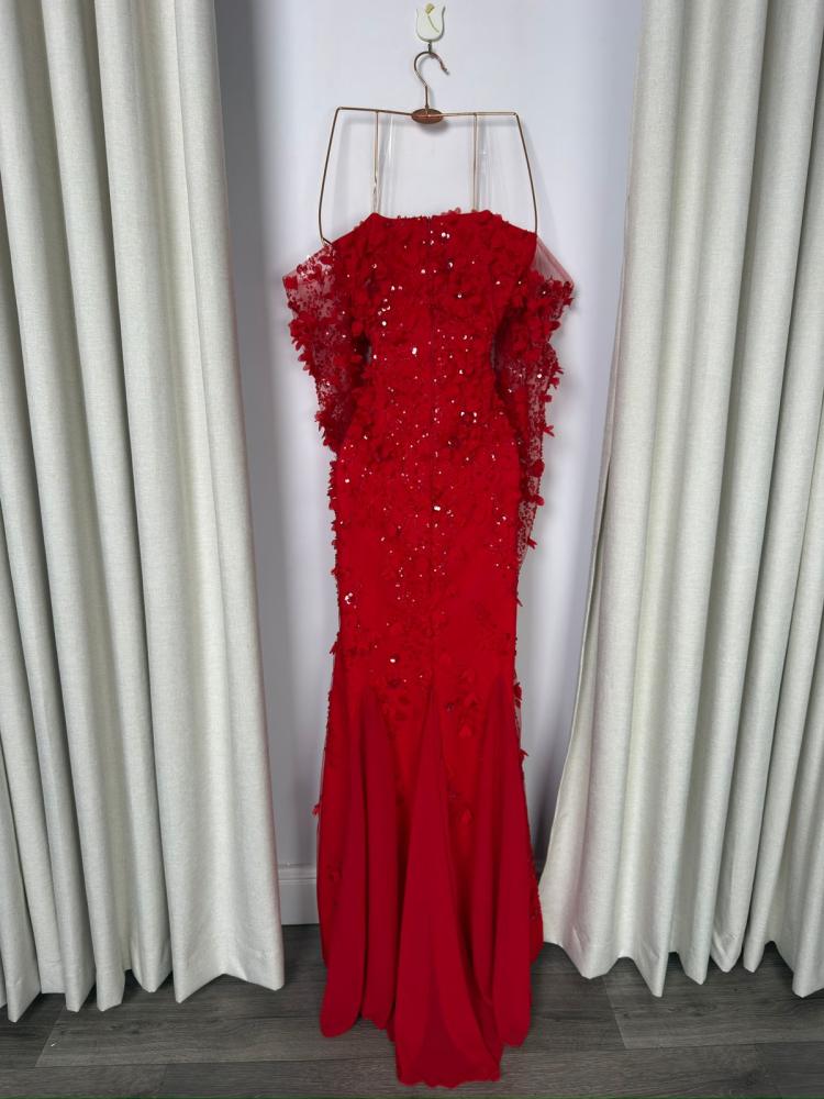 Red Barbie evening dress with a gold belt