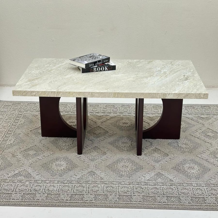 Coffee table surface with rough textured stone alternative, wooden base, brown color