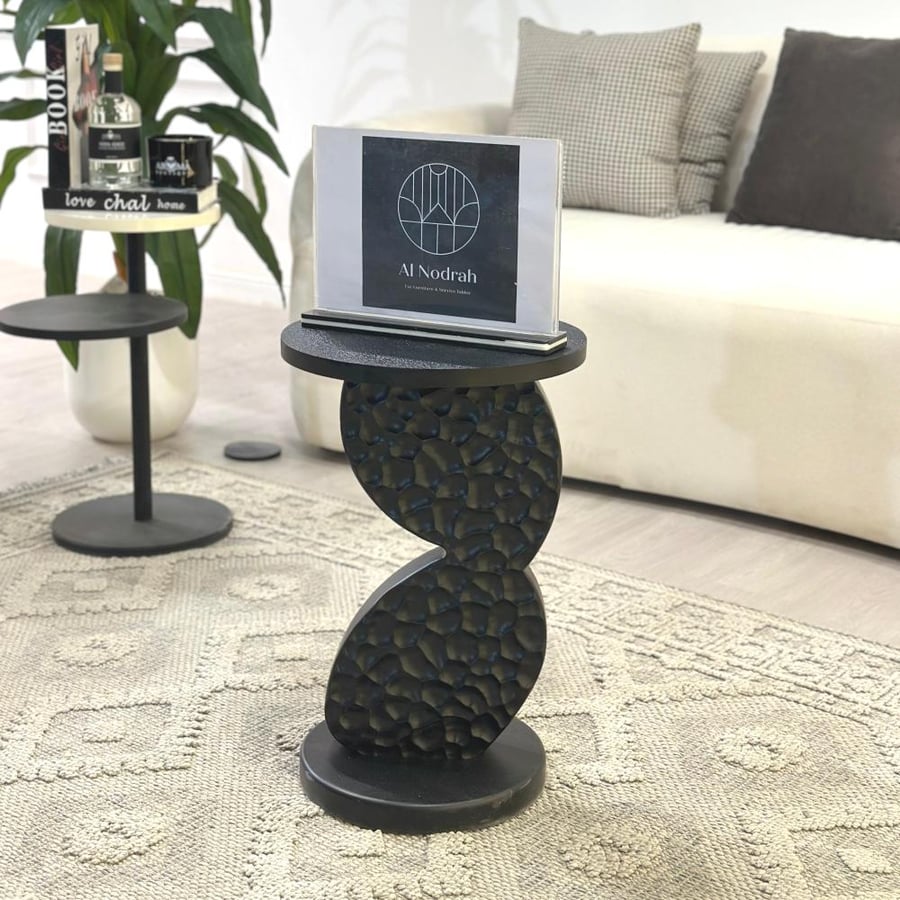 Service table with a surface alternative to black stone marble with a wooden base in a new design