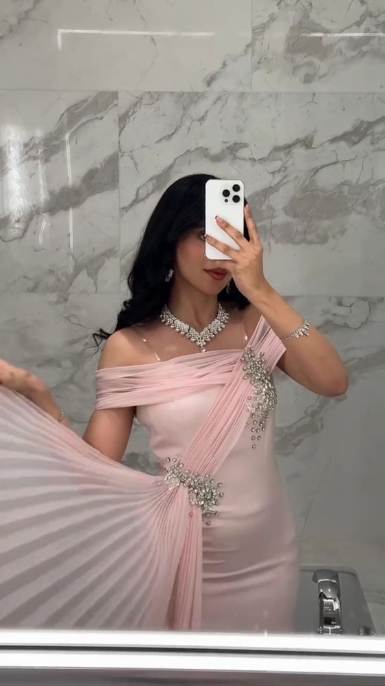 Evening dress Barbie with a prominent belt, slits, and accessories