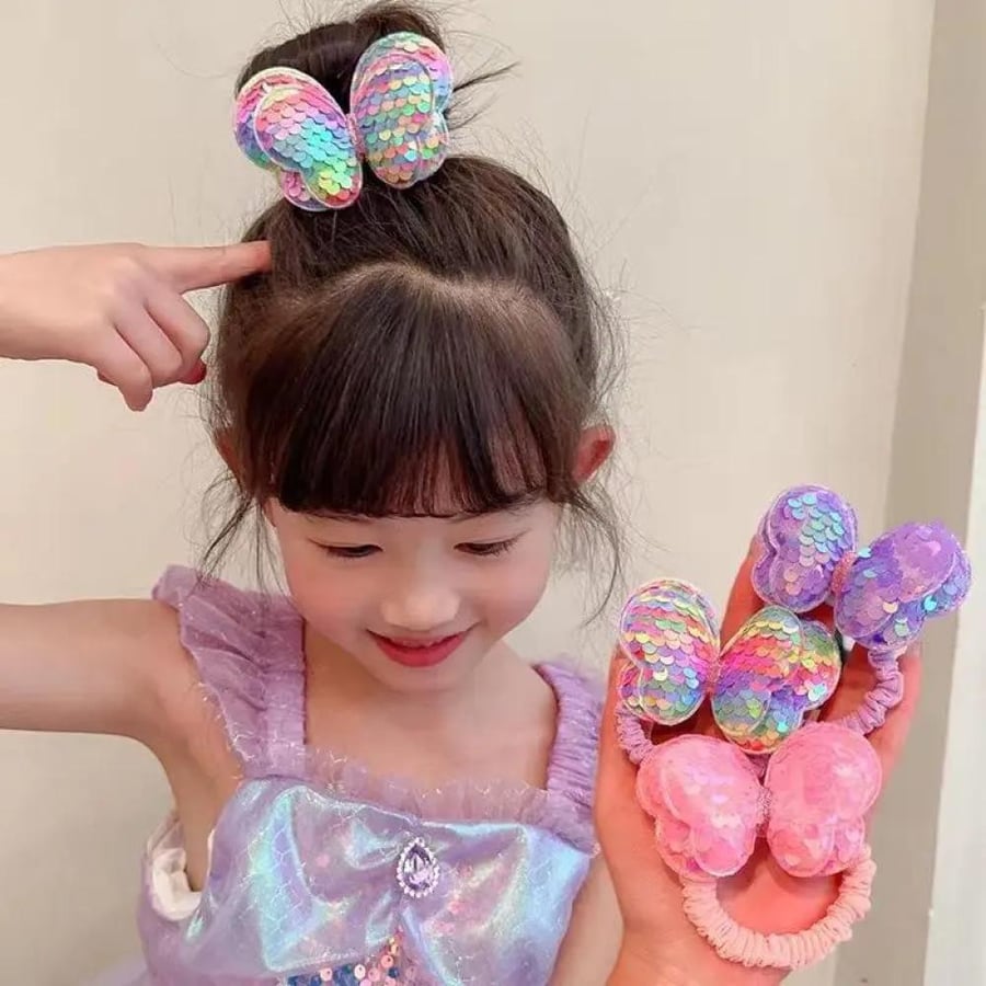 A rubber hair band in the shape of a butterfly