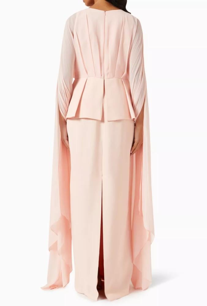 Evening dress with a feminine design, long cape, and a belt decorated with crystals
