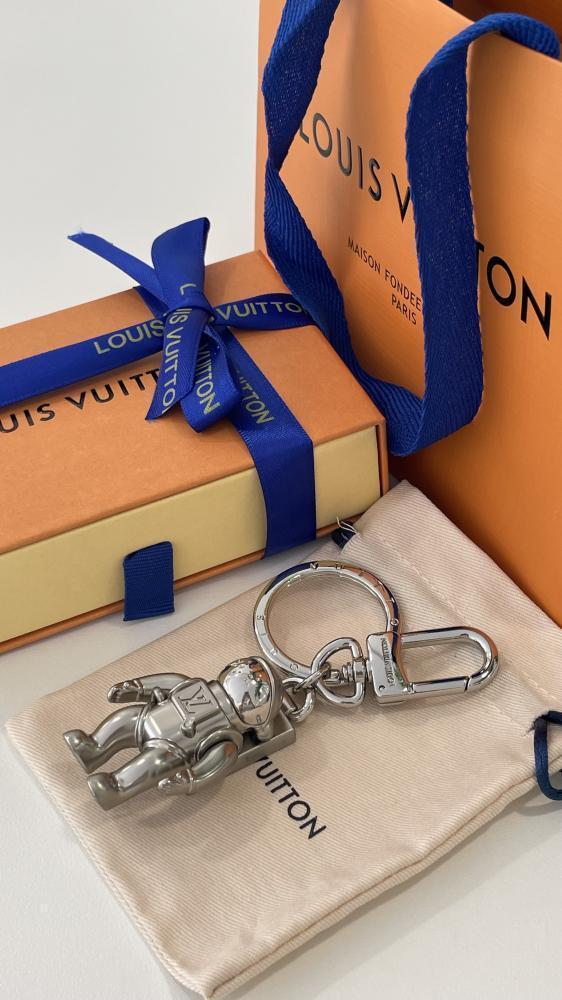 LV keychain medal in the shape of an astronaut, silver, with accessories