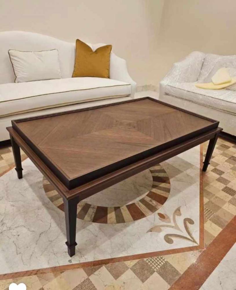Wooden coffee table with walnut shell surface, hollow top