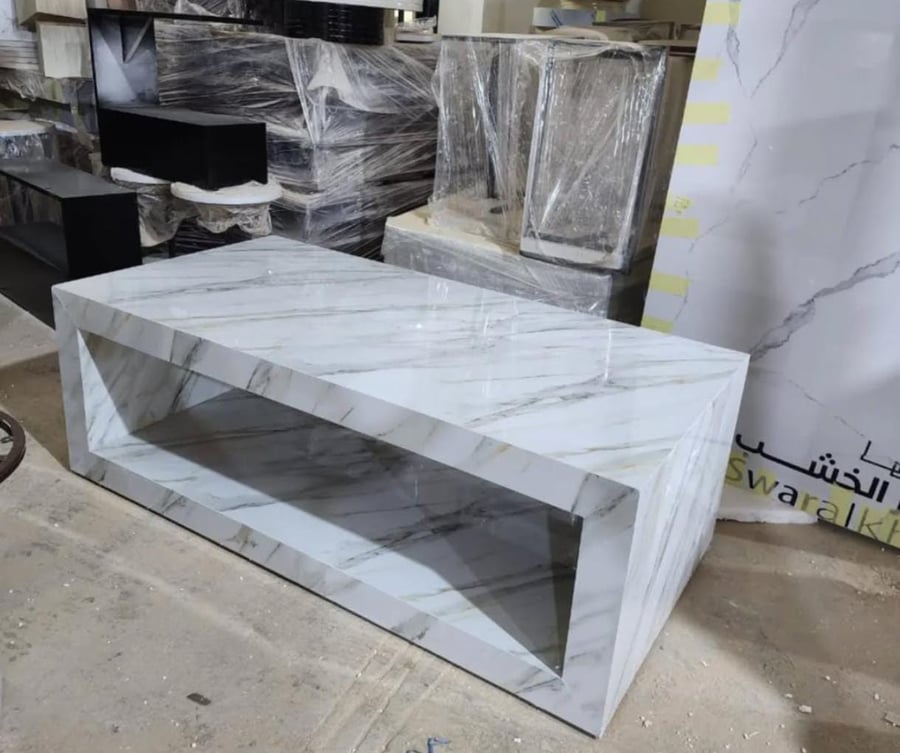 Coffee table with marble alternative