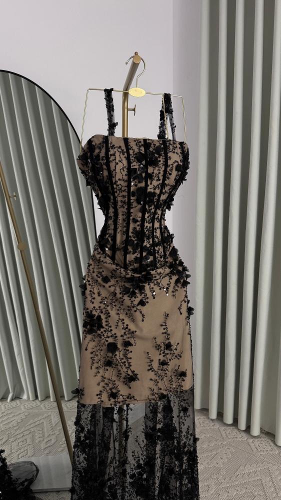Elegant evening dress made of Barbie fabric with hand embroidery