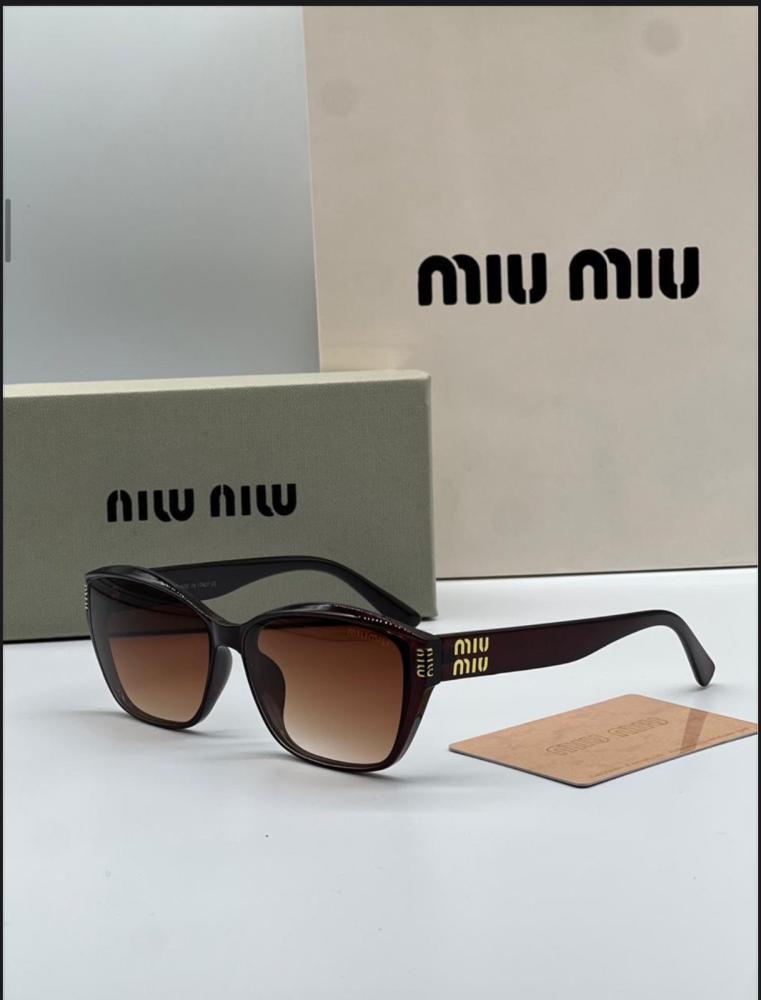 Miu Miu brand glasses in a style