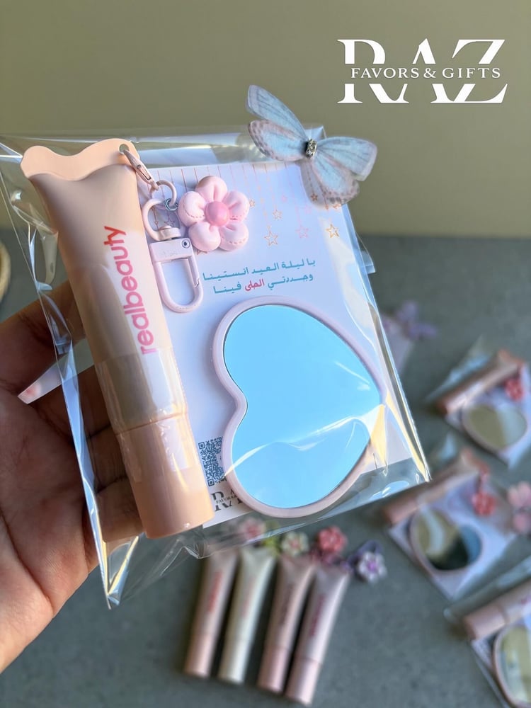 قلوس بميدالية مع مرايه