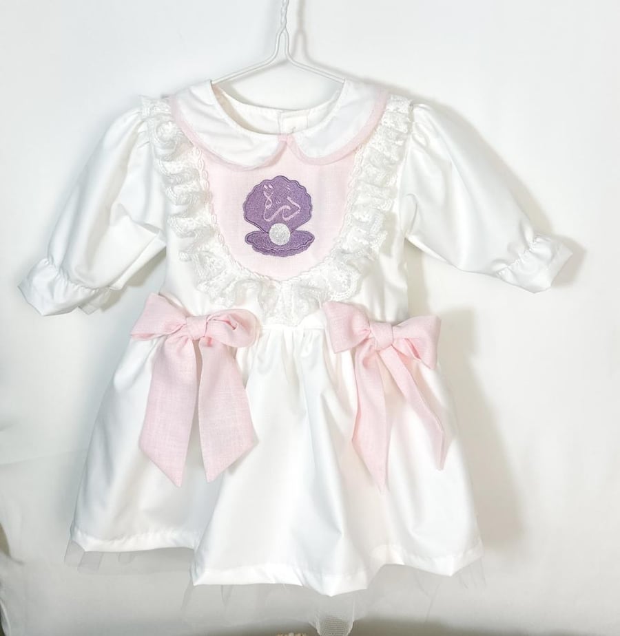 Baby dress with shell embroidery