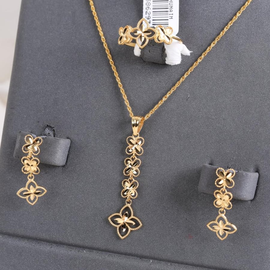 نص طقم عيار 21