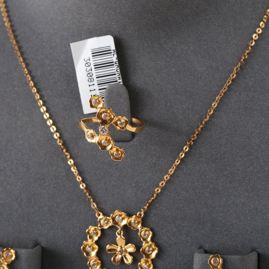 نص طقم عيار 21