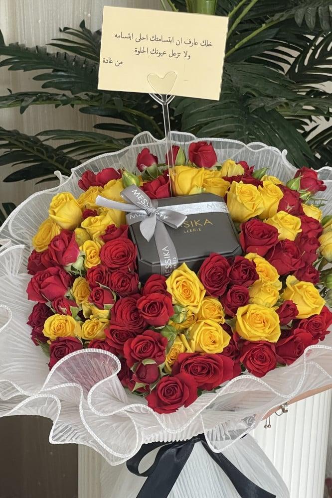 باقة ورد بيبي روز احمر واصفر + اسورة مسيكا رجالي فضي