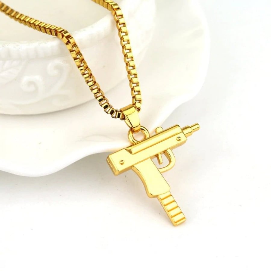 Men's chain with a pendant in the shape of a person - pistol, gold color