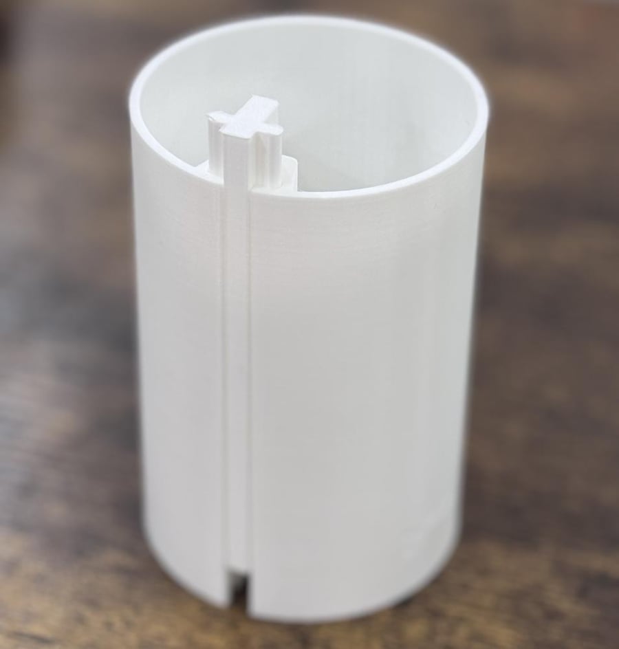 A tool or mold for manually shaping a cup (with slices)