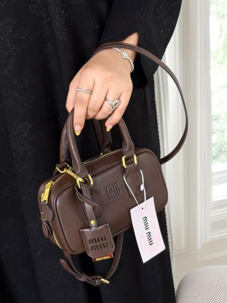 Miu Miu bag from Mini Coffee, Mr. Quality, tough country