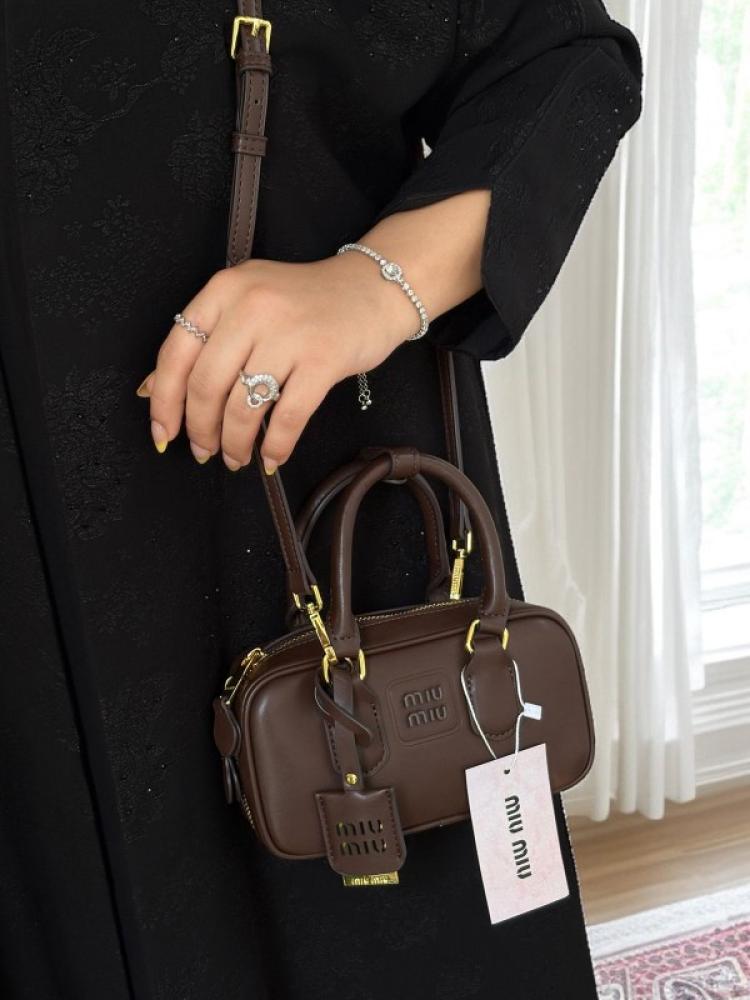 Miu Miu bag from Mini Coffee, Mr. Quality, tough country
