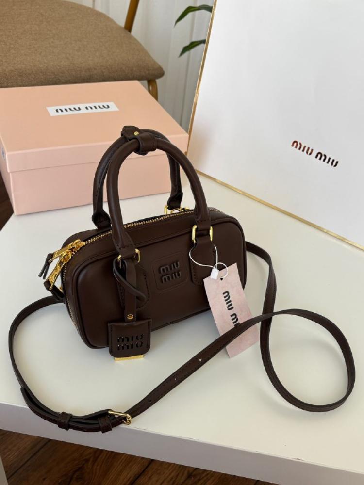 Miu Miu bag from Mini Coffee, Mr. Quality, tough country
