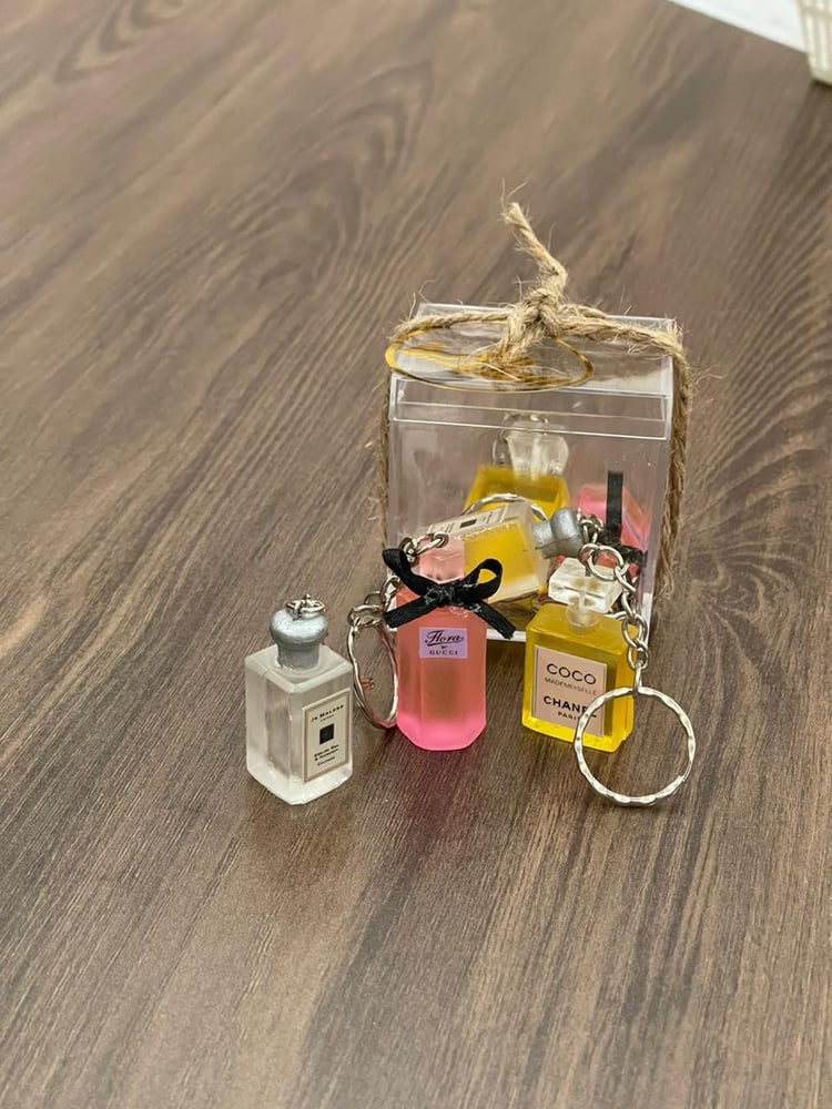 توزيعات ميداليات عطور