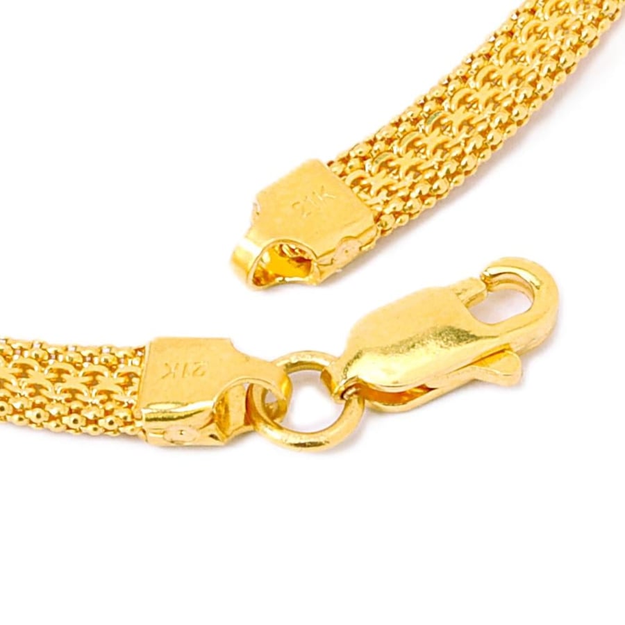 A distinctive 21-karat gold bracelet