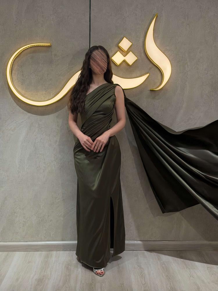 فستان سهرة زيتي تفته بكسرات فستان رايا