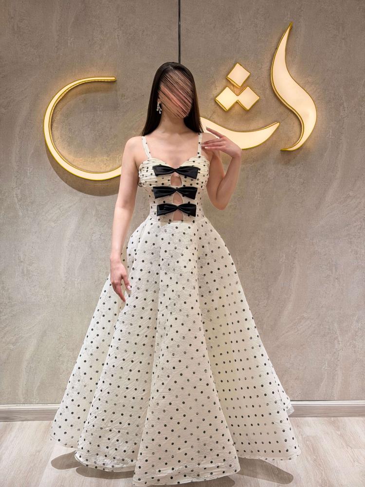 فستان جيسي / نعومة السكري بلمسة الاسود