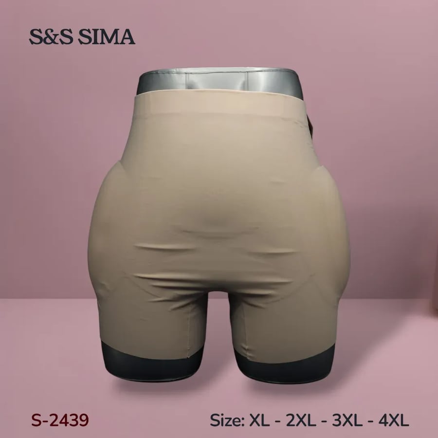 Short compression garment with padding