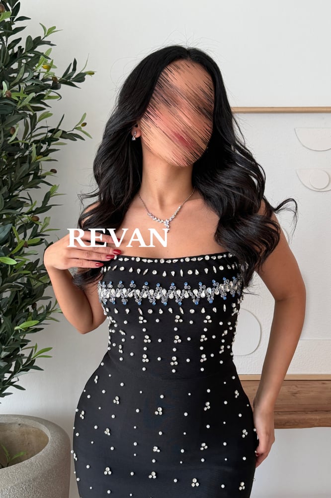 black dress studded with crystals