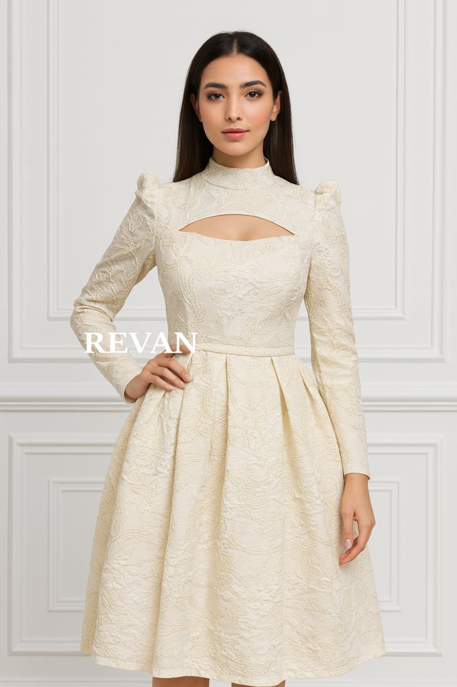 A luxurious midi dress from Rivan in an off-white color with embroidery.