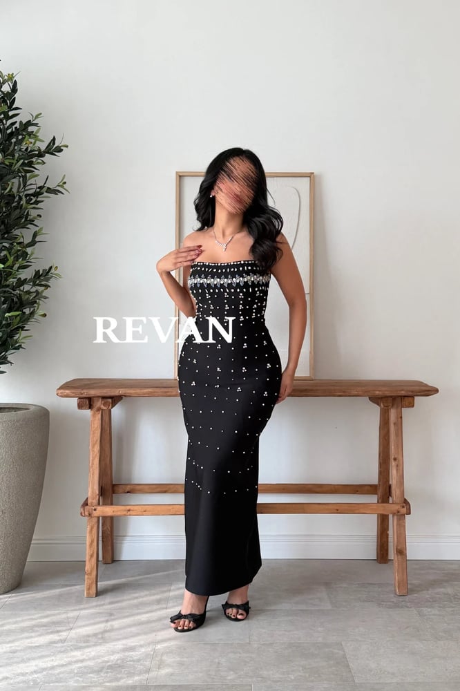black dress studded with crystals